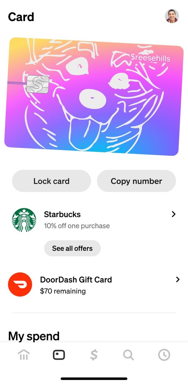 The Card tab in 2024: a custom card with a hand-drawn dog in 3D as the hero, Lock card and Copy number buttons under it, then offers and My spend
