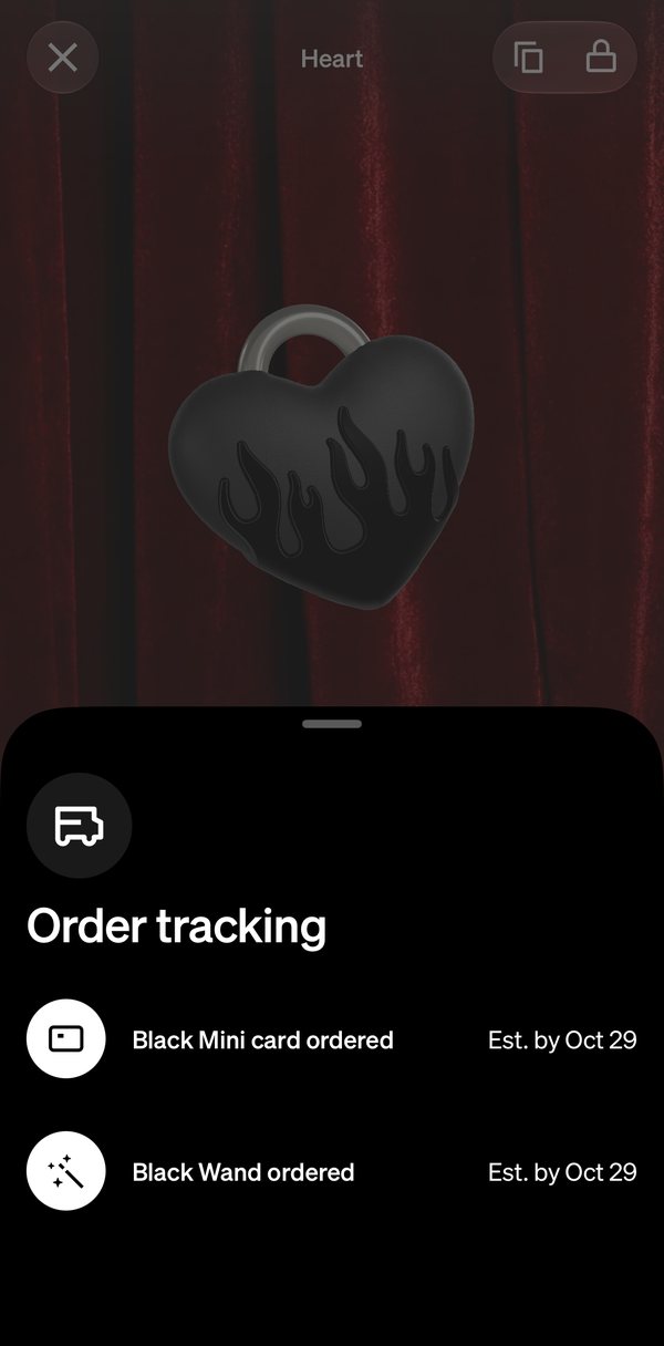 The Order tracking drawer over the Heart tag: Black Mini card ordered and Black Wand ordered, each estimated by Oct 29