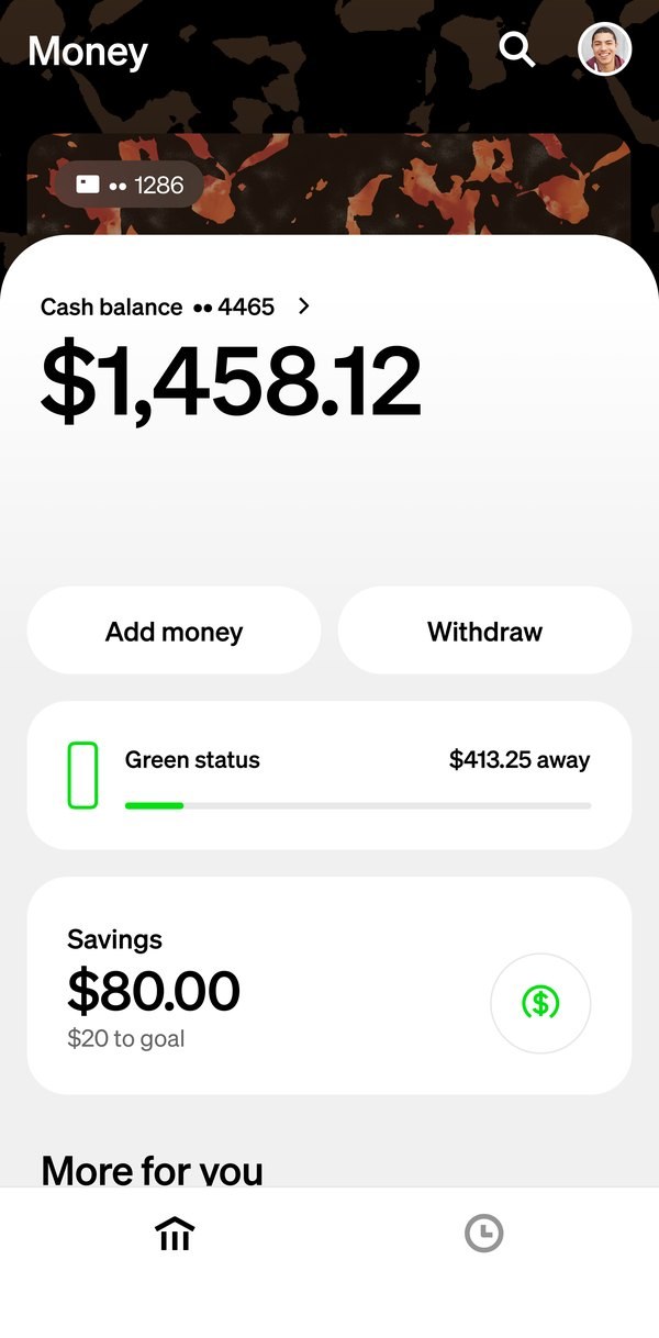 The Money tab themed by the tortoise card: the header and the card peeking above the balance take on its material