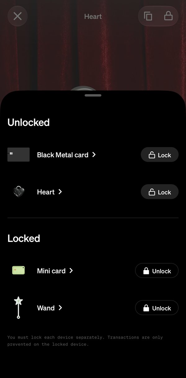The lock drawer: the Black Metal card and Heart unlocked, the Mini card and Wand locked, each with its own button