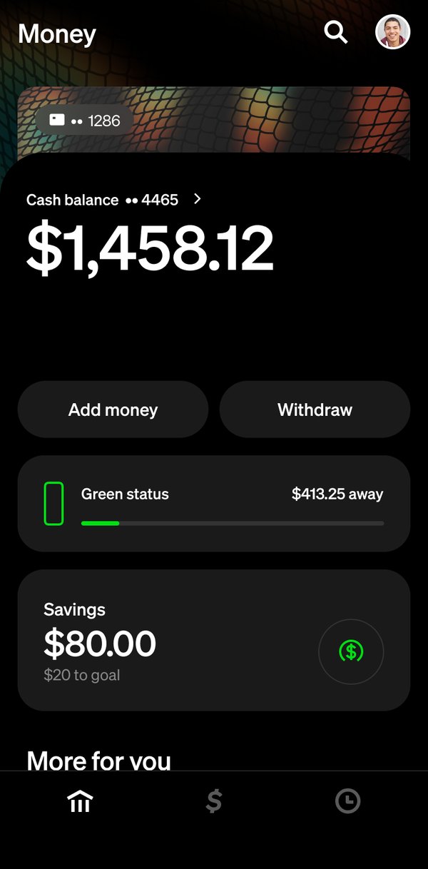 The Money tab in dark mode, themed by the holo mesh card: the header and the card peeking above the balance take on its material