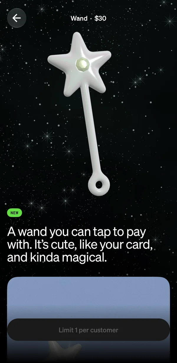 The Wand’s page: the pearl star wand in 3D over a starfield, A wand you can tap to pay with. It’s cute, like your card, and kinda magical.